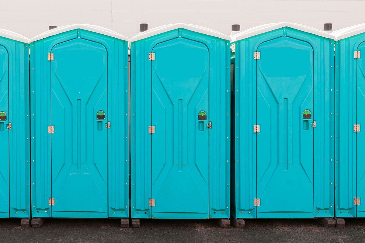 Industrial portable restroom units at a plant in Bend, Oregon